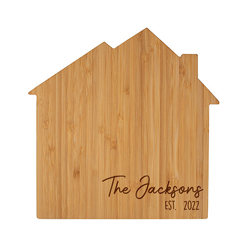 House shaped cutting board engraved with The Jacksons est. 2022
