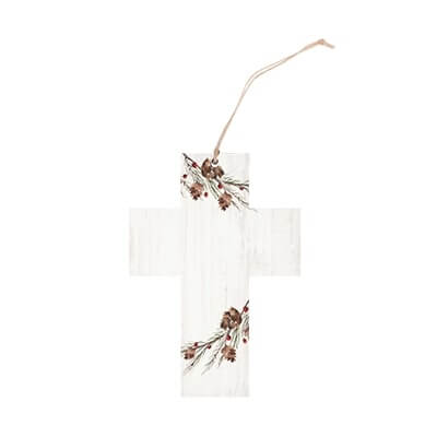 cross ornament with pine and berries
