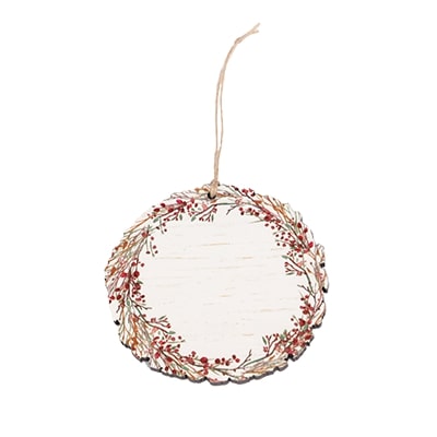 round holiday ornament with pine and berries