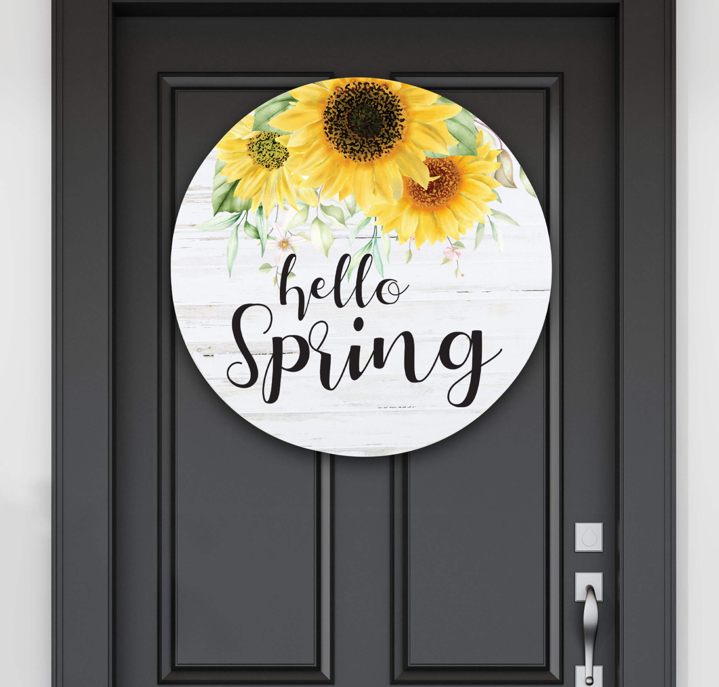 round wood home decor customized with flowers and hello spring hanging on a front door
