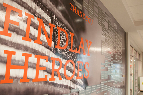 Angled view of the recognition wall at University of Findlay for honoring service members